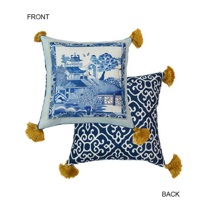 Square cushion with blue and white traditional chinese garden design and mustard-yellow tassels from decorbites blue chinoiserie home pagoda collection