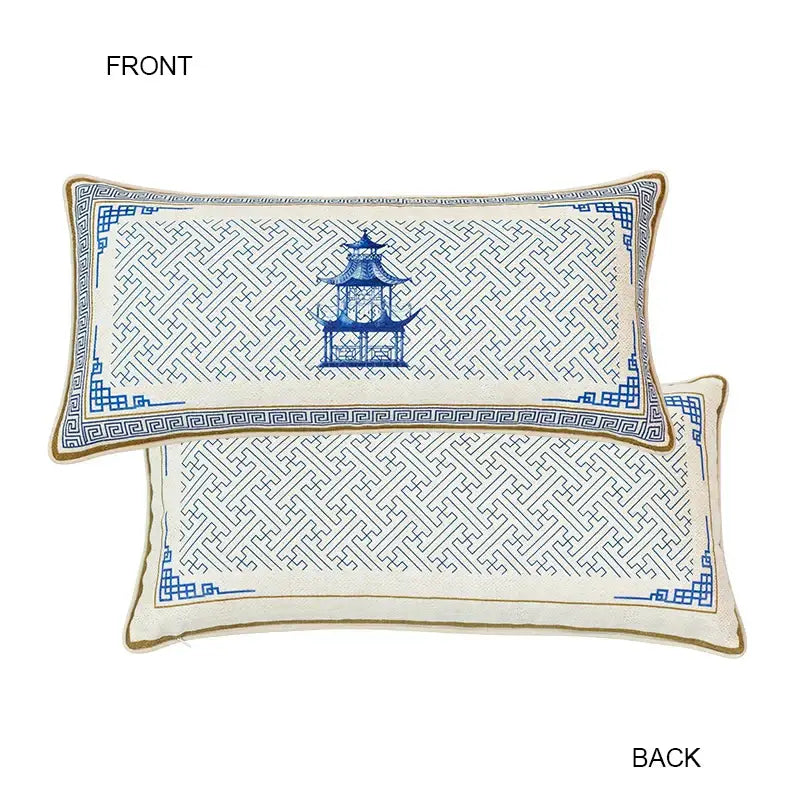 Rectangular cream fabric cushion with intricate blue geometric pattern and central chinoiserie home pagoda embroidery