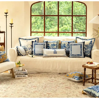 Cream-colored sofa with decorbites blue chinoiserie pagoda bolster pillowcase featuring traditional chinese designs