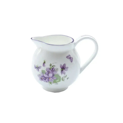 White ceramic pitcher with purple violet floral and butterfly design from blue dream tea set porcelain tableware