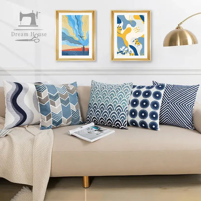 Set of five decorbites blue floral cushion cover pillows in navy blue and white with geometric and wave patterns