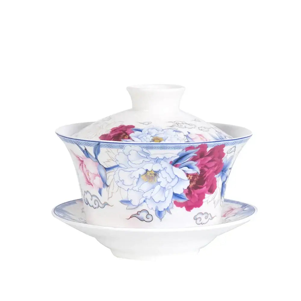 Blue floral white porcelain tea cup set featuring hand-painted peony flowers in pink, blue, and red with gold centers