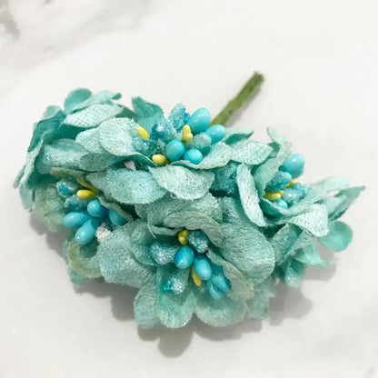 A delicate turquoise lace flower cherry stamen bundle with blue and yellow beads for decorbites blue flower decor