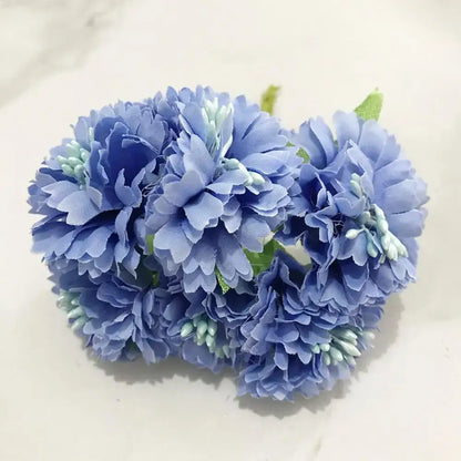 A cluster of decorbites blue flower cherry stamen berries bundle with layered blue petals and light green stems for living room decor