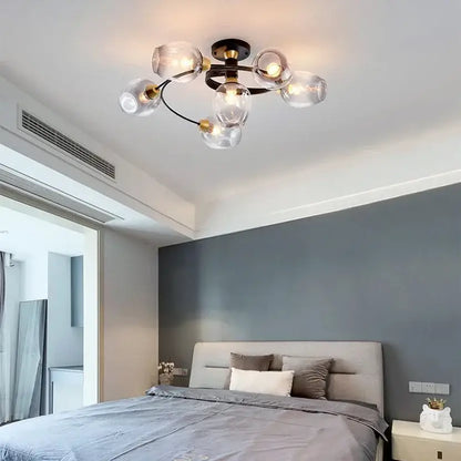 Modern ceiling light fixture with five clear glass ball bulbs and dark bronze metal frame for dining room decorbites glass ball led