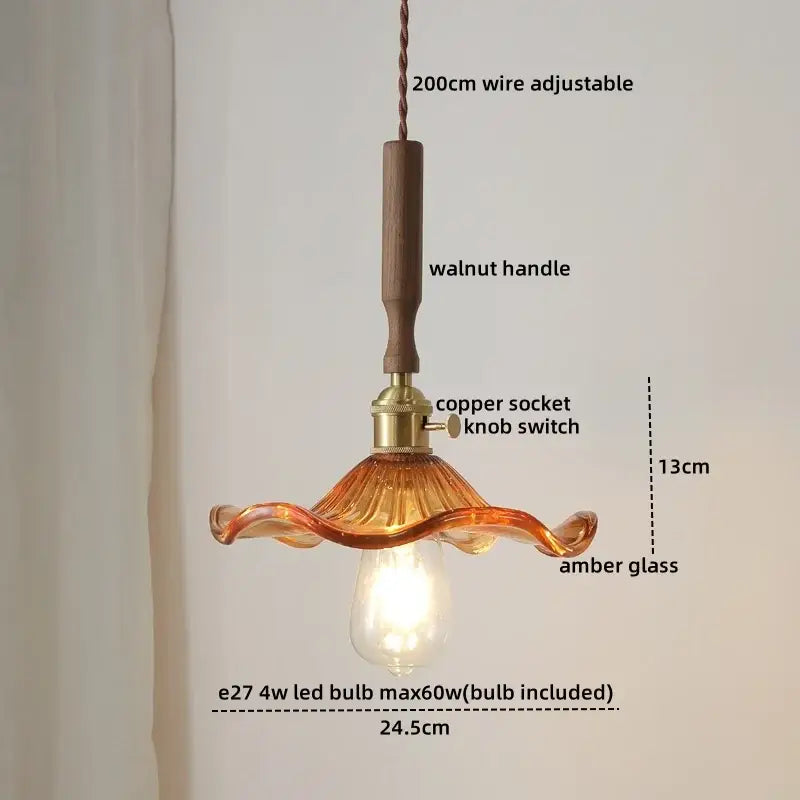 A warm amber glass pendant lamp with wooden walnut handle and copper socket for decorbites blue glass led lighting