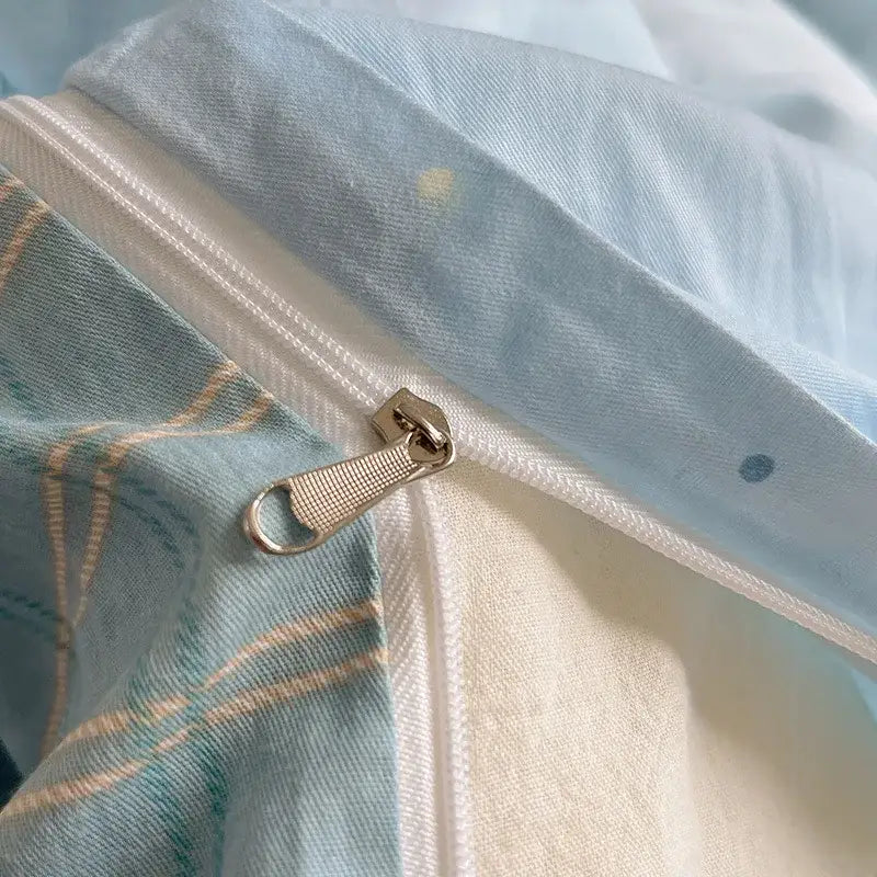 Silver zipper pull on light blue and white plaid fabric of blue poodle print cotton cartoon bedding set decorbites cotton cartoon printed