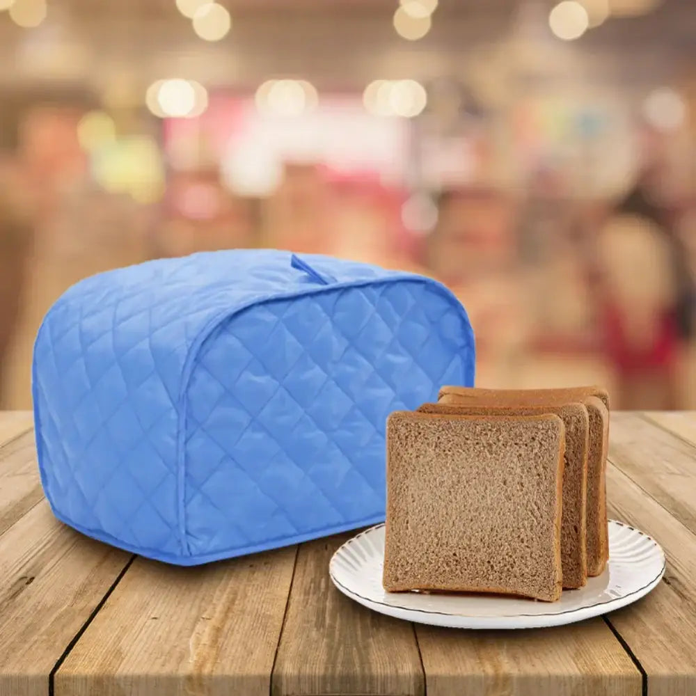 Blue quilted fabric 4 slice toaster cover designed as a protective appliance cover for slice toaster use