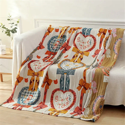 White gauze cotton bath towel featuring colorful hearts bows and sweet baby text in pastel tones for bedroom use