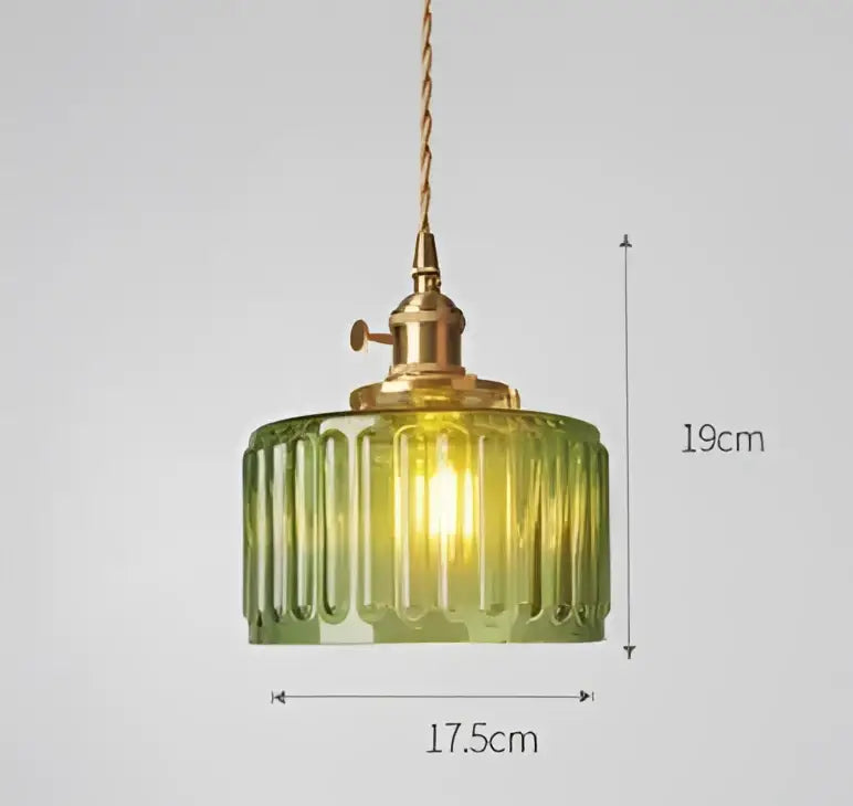 Green ribbed glass pendant light with brass hardware showcasing decorbites pendant lights for bedroom decor