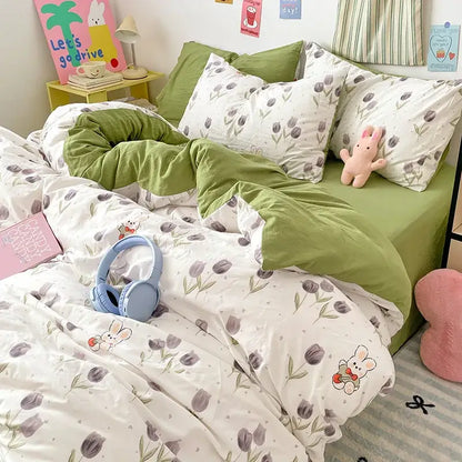 A cozy green and white tulip bedding set made of soft plush decorbites cloud cotton printed fabric