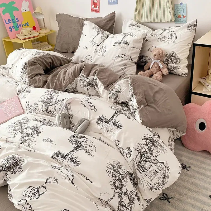 White duvet set with black ink-style tree and animal illustrations on soft cotton cloud cotton printed bedding sets by decorbites