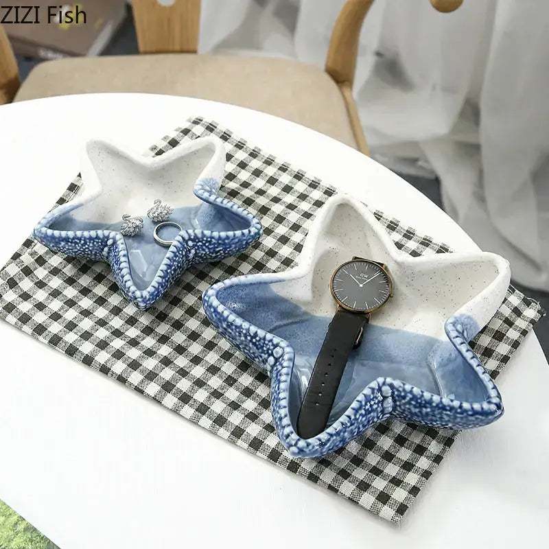 Two ceramic marine life trinket dishes in blue speckled and white with textured edges for decorbites ceramic marine use