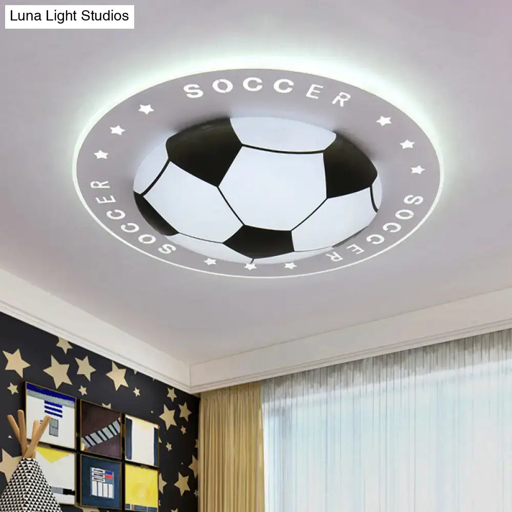 Decorbites kids led flush mount spotlight featuring a black and white soccer ball design with acrylic shade and soccer lettering