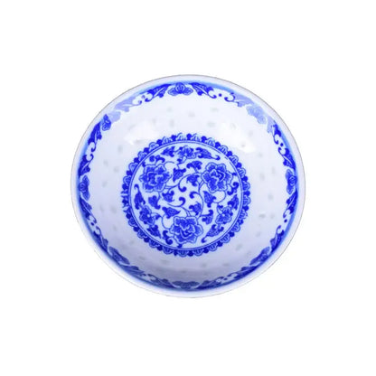 White porcelain dragon pattern dish set bowl with intricate blue floral vine patterns and decorative border detailing