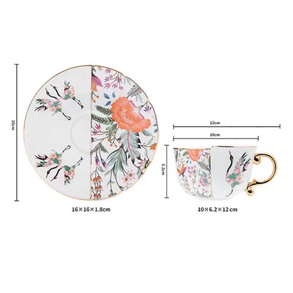 A blue white porcelain gilded coffee mug and saucer with vibrant floral and black crane design by decorbites blue white