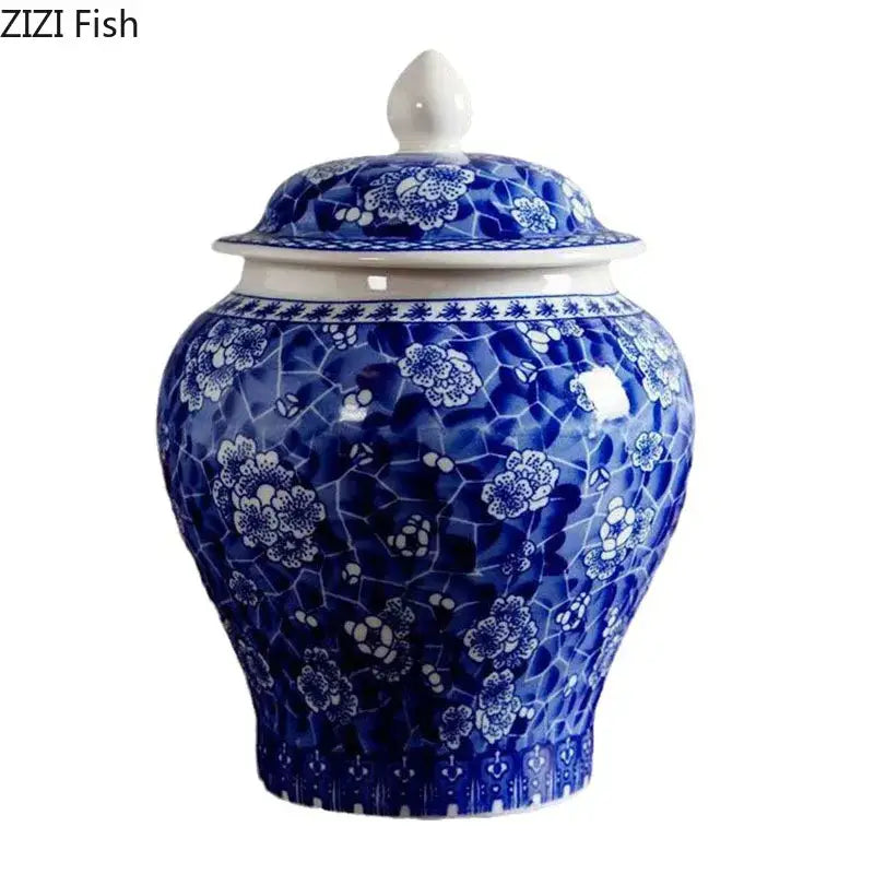 Blue and white white porcelain tea canister with intricate floral mosaic pattern and matching lid for kitchen storage