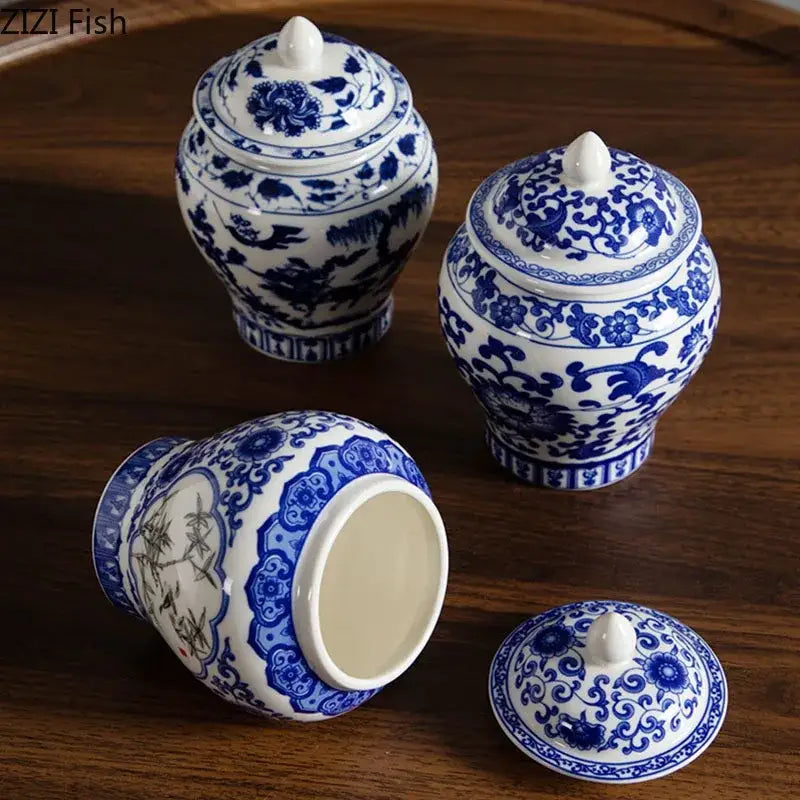 Blue and white porcelain tea canister with intricate floral patterns and matching lids for kitchen storage jar