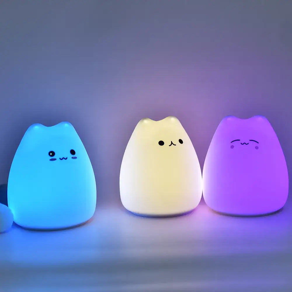 Three soft-glowing blue white and purple cat silicone touch night lights ideal as decorbites cat silicone bedroom lamps