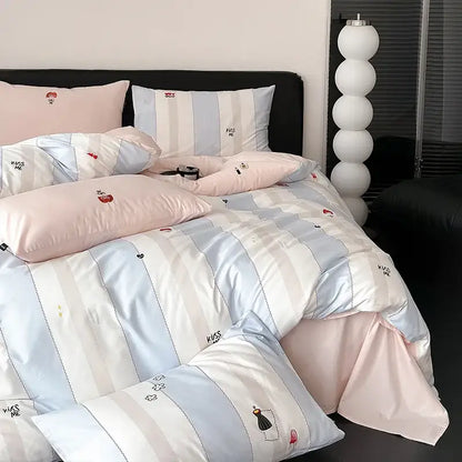 Pastel blue and white striped duvet cover set with embroidered kiss me text and small cartoon motifs for bedroom use