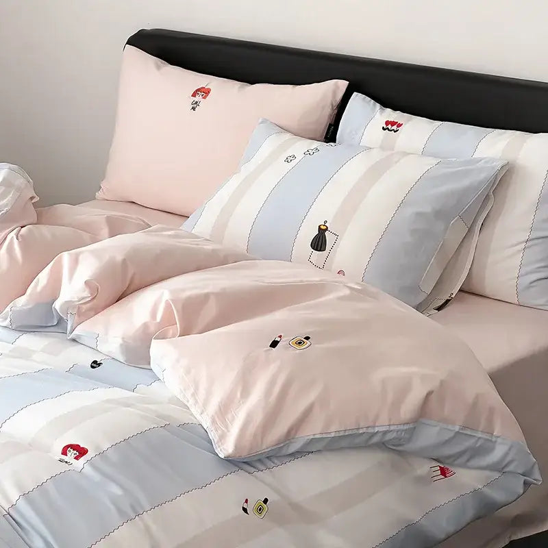 Pastel pink and light blue striped duvet cover set with embroidered cartoon fashion illustrations for bedroom use