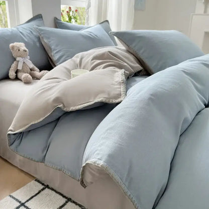 Soft pastel blue quilted duvet cover bedding set with subtle cotton edge embroidery and matching pillowcases decorbites cotton edge