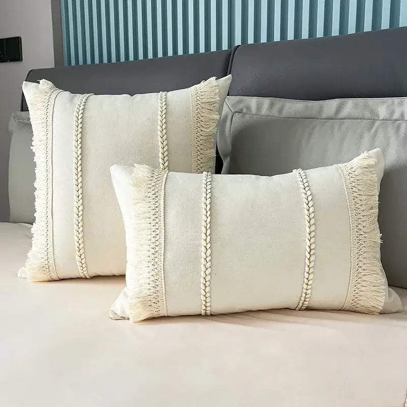 Cream-colored rectangular throw pillows with textured braided cord and fringed edges for decorbites bohemia tassel cushion cover