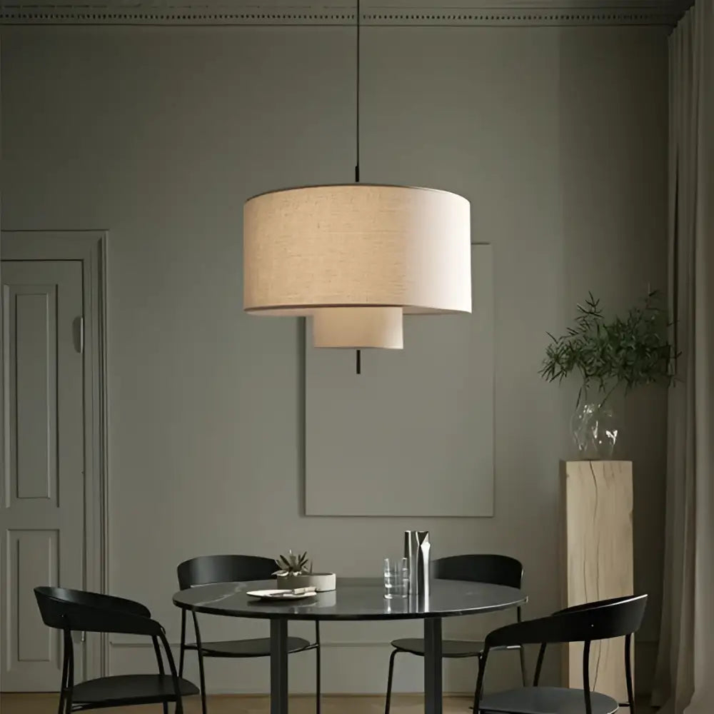 Beige linen tiered pendant lights with modern minimalist design from decorbites bohemia wabi for dining room decor