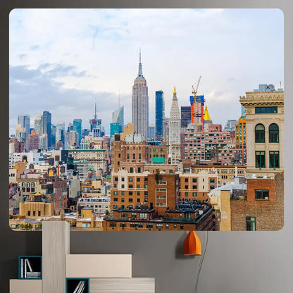 A vibrant orange pendant lamp with modern design complements decorbites bohemian art tapestry empire state cityscape blanket