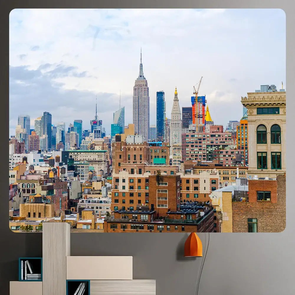A vibrant orange pendant lamp complements decorbites bohemian art tapestry featuring empire state cityscape design