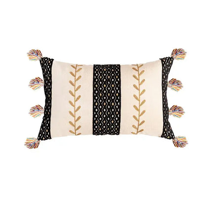 Cream-colored cotton cushion cover with black and gold embroidery and colorful tassels by decorbites bohemian cotton
