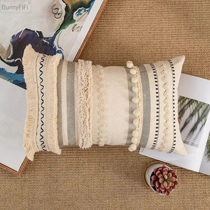 Bohemian beige cushion cover with beige and gray stripes, textured fringe, pom-poms, and embroidered details for decorbites bohemian beige decor