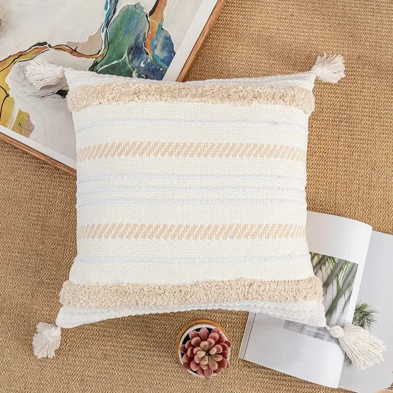 Cream and white striped woven cushion cover with tassel trim for living room decor by decorbites bohemian beige