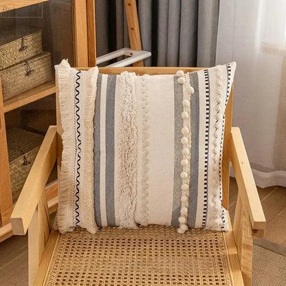 Bohemian beige striped cushion cover with tassels featuring cream and gray vertical stripes for home decor