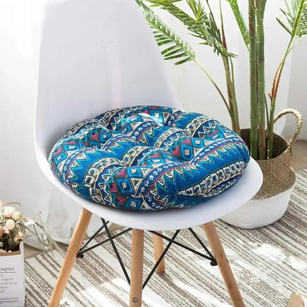 Bohemian blue green and red geometric meditation cushion pouf with blue patterned tribal-inspired designs