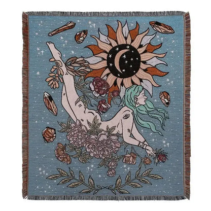Bohemian camping blanket by decorbites featuring a woven celestial tapestry with sun-moon motif on soft blue background