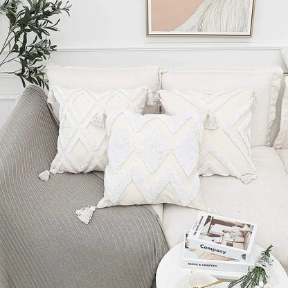 Cream-colored bohemian chenille pillowcase with textured diamond chevron patterns and soft white tassels for living room decorbites bohemian