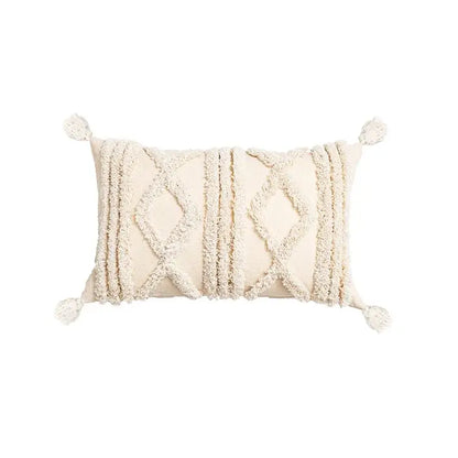 Cream-colored cushion covers with woven diamond patterns and tassels for decorbites bohemian tassel living room decor