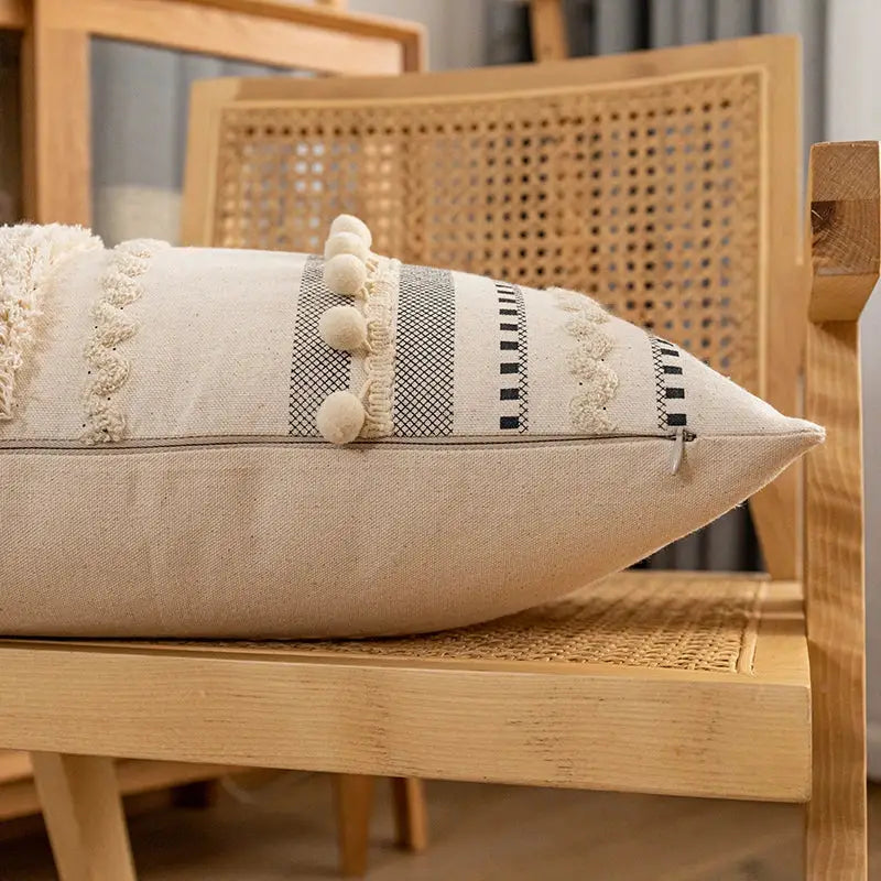 Beige linen cushion cover with black geometric stripes cream pom-poms lace trim decorbites bohemian cotton design