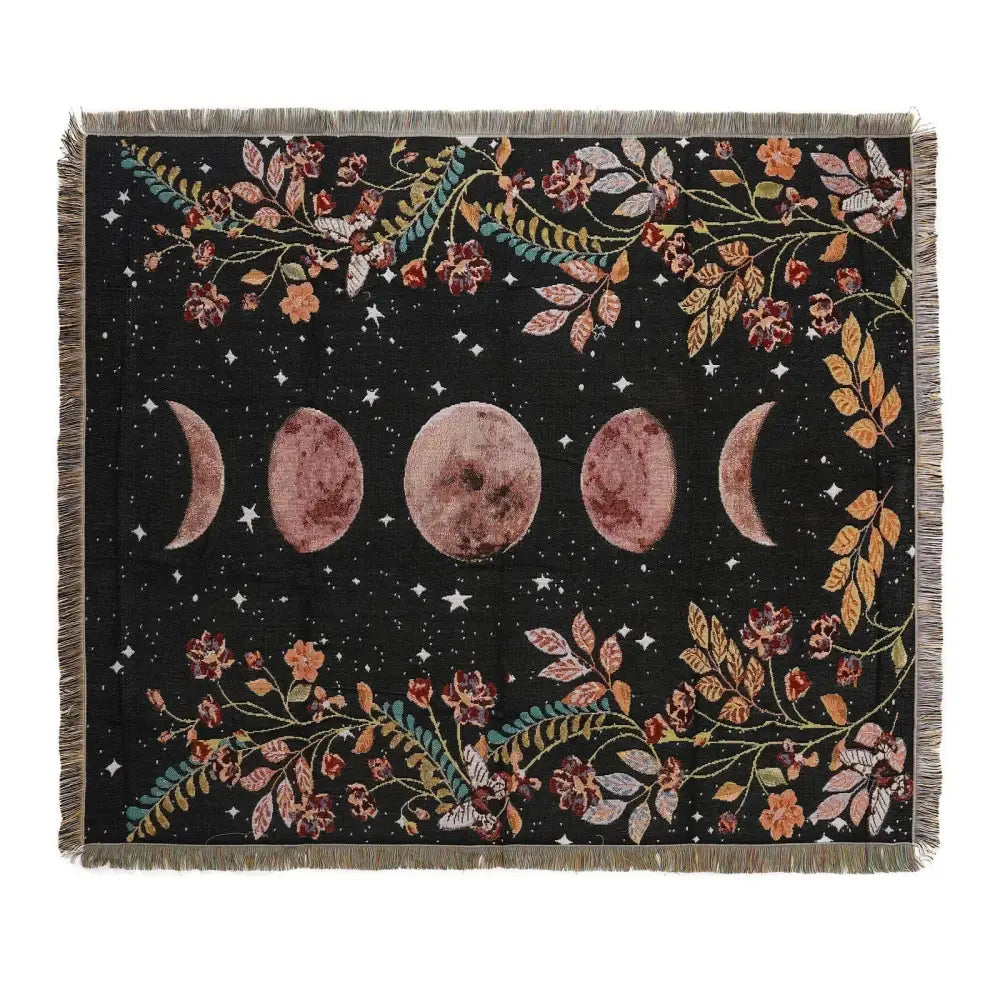 Black woven throw blanket with celestial moon phases and floral design in muted rose and gray tones decorbites bohemian throw