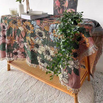 Bohemian throw blanket with vibrant pink orange cream floral pattern woven fabric and fringed edges for decorbites decor