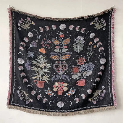 Black woven bohemian throw blanket with embroidered floral and moon phases and pink fringe decorbites bohemian throw