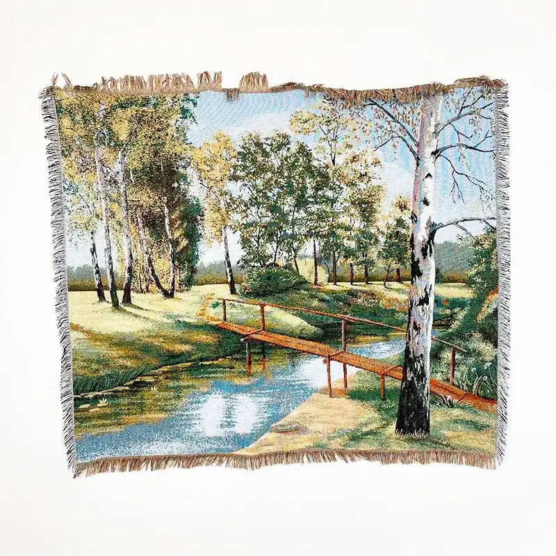 Bohemian jacquard sofa blanket with woven pastoral autumn forest scene featuring birch trees and a wooden bridge