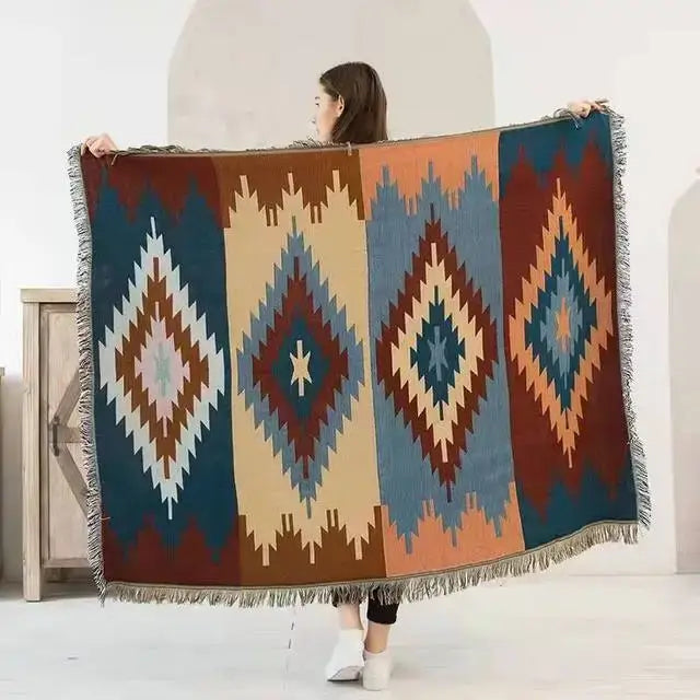 A decorbites bohemian knit throw blanket with geometric diamond pattern in teal rust beige and orange for living room decor