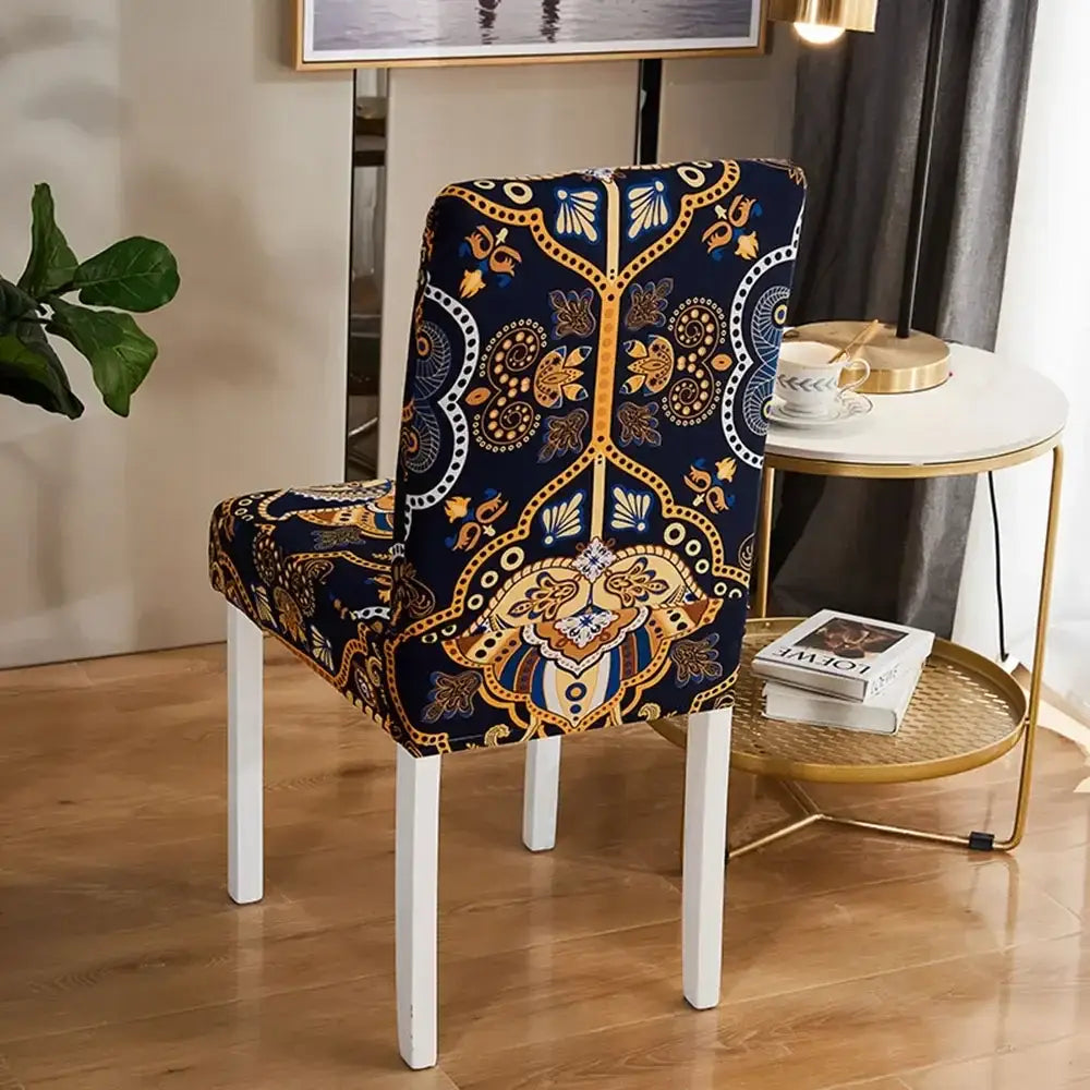Navy blue and gold ornate bohemian mandala stretch chair cover on white wooden dining chair decorbites bohemian mandala