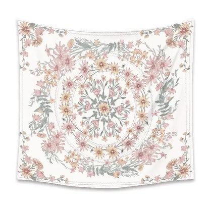 A delicate white wall hanging with a bohemian mandala flower design in pink green for bedroom decor by decorbites