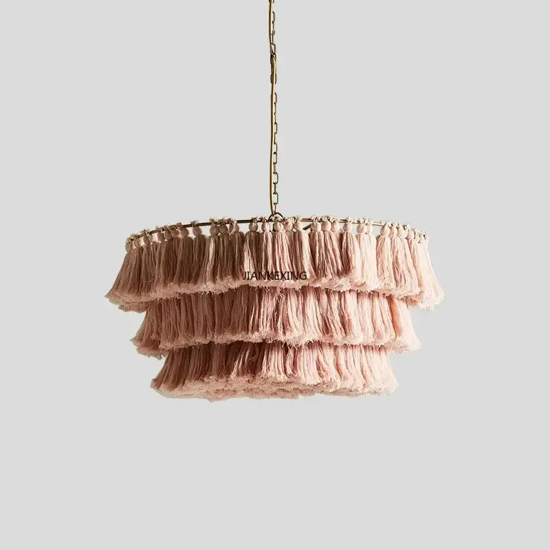 Bohemian vintage fela pink tassel pendant light with three-tier fringed fabric design hanging from brass chain decorbites vintage
