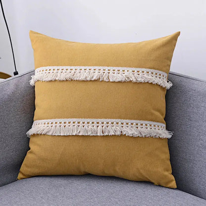 Boho beige linen tassel pillow cover set featuring a mustard yellow pillow cover with cream fringe trim for sofa use