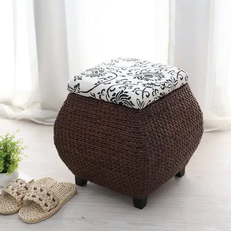 Brown woven rattan 3-in-1 storage stool with white lid and black floral embroidery for bedroom footrest use