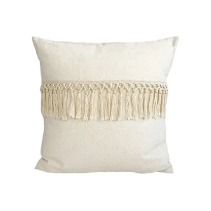 Cream-colored linen cotton pillow cover with horizontal macrame fringe band for boho living room decor